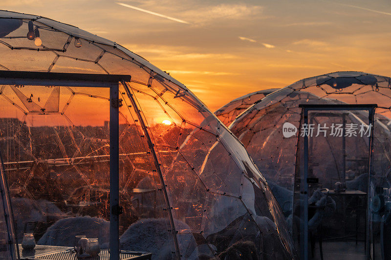 Sunset over street café domes in Bucharest